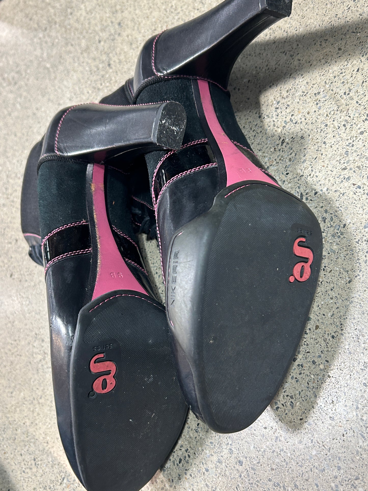 Black and pink lace-up heel boots