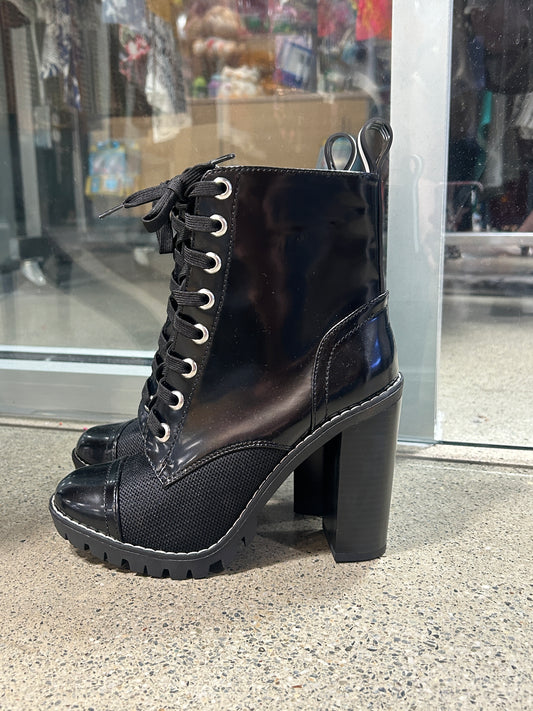 Black leather combat style chunky heel boots