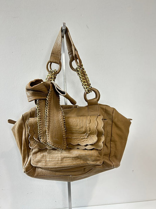 Tan leather purse with bow detail and gold hardware