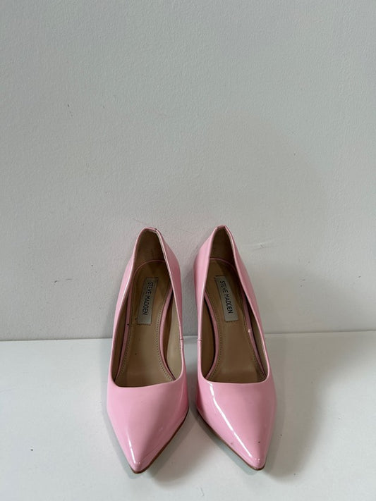 Pink patent leather pumps