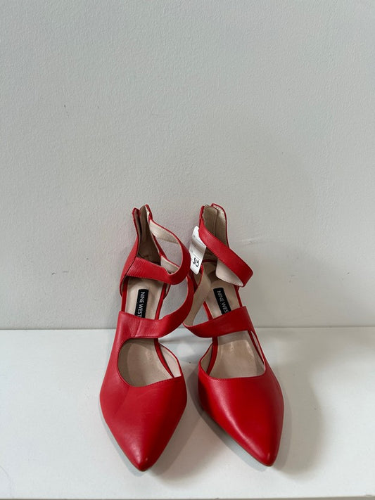 “Florent” leather pumps in red