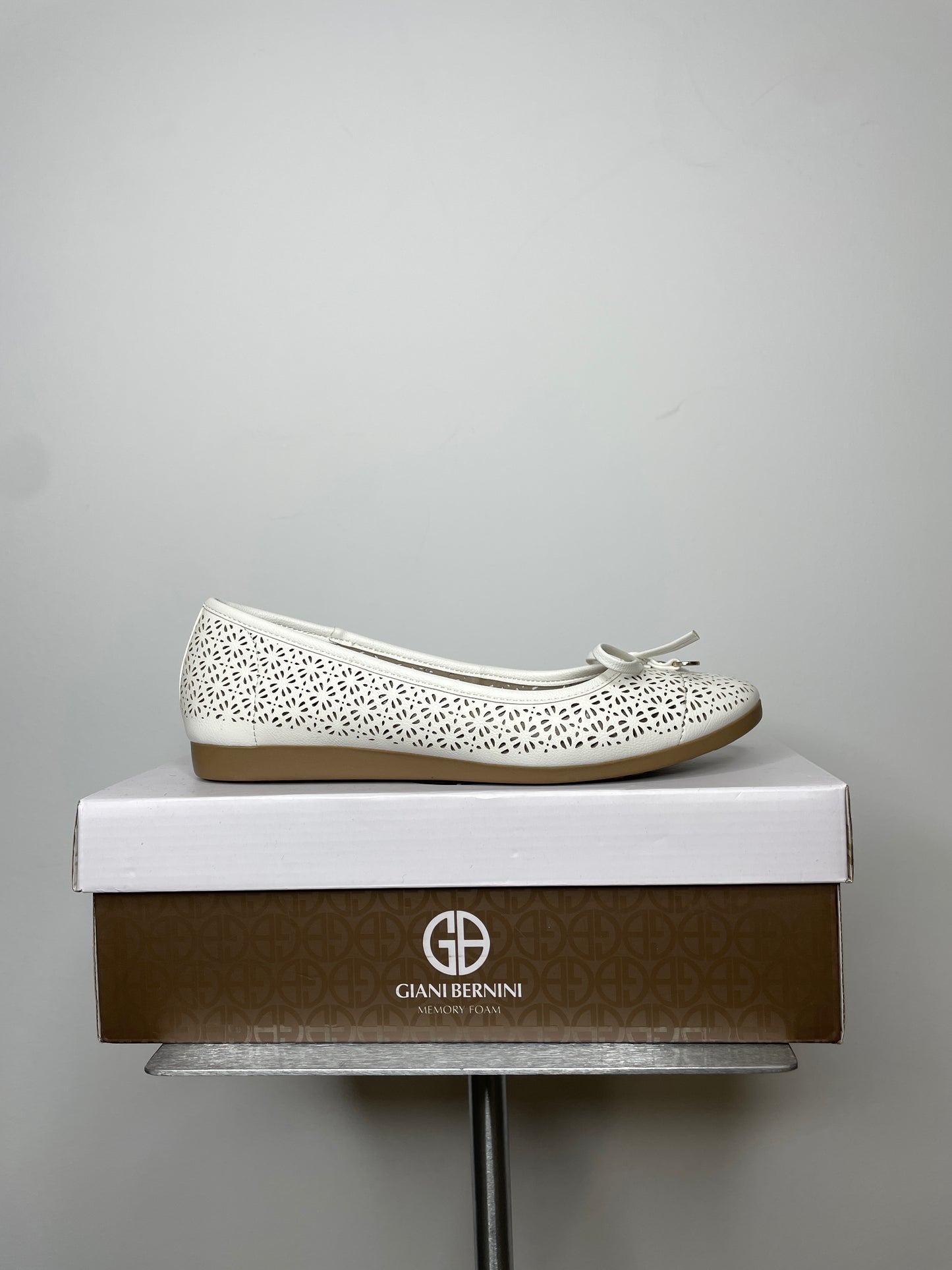 White perforated ballet flats