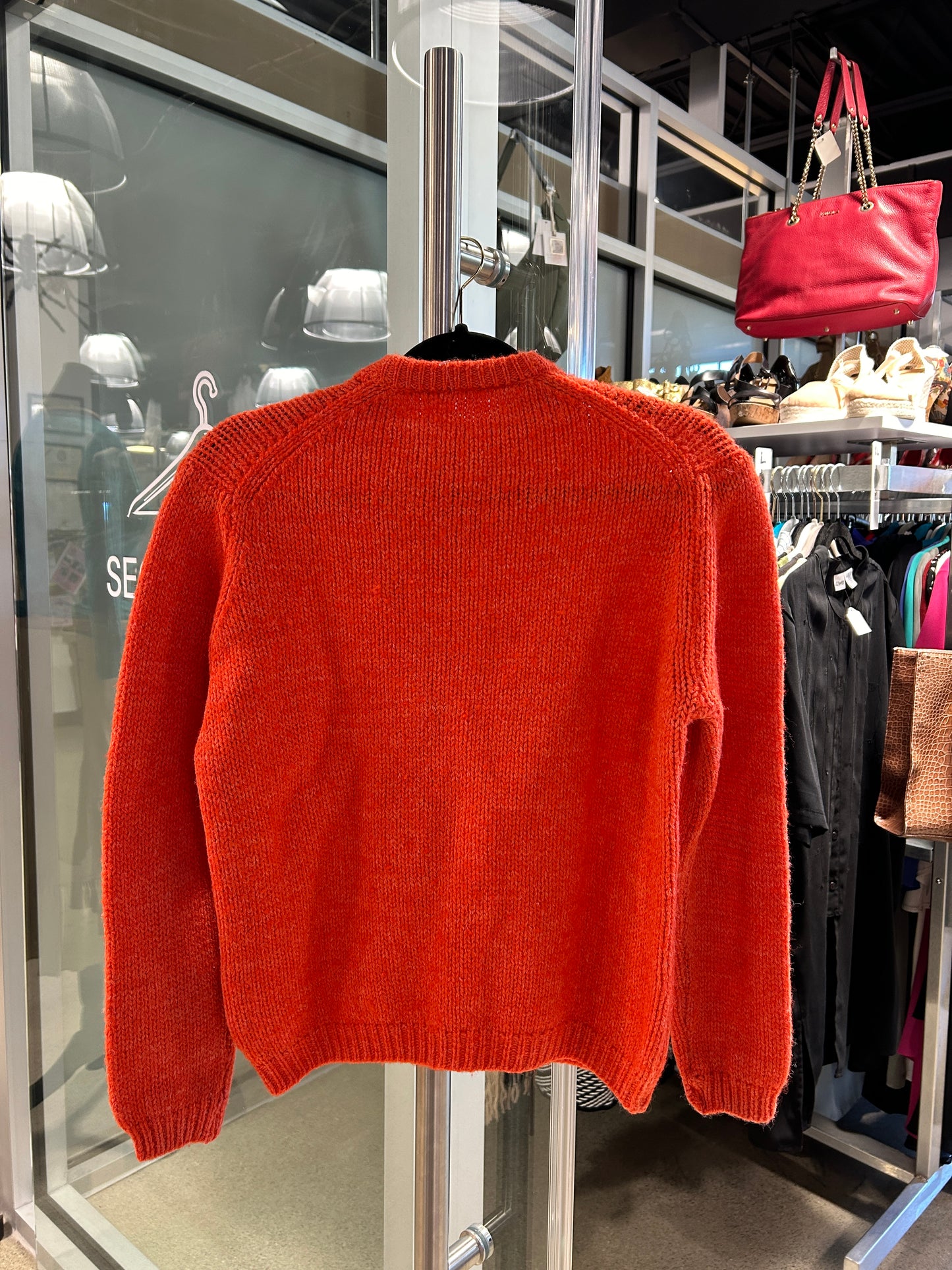 Orange cable knit button closure cardigan