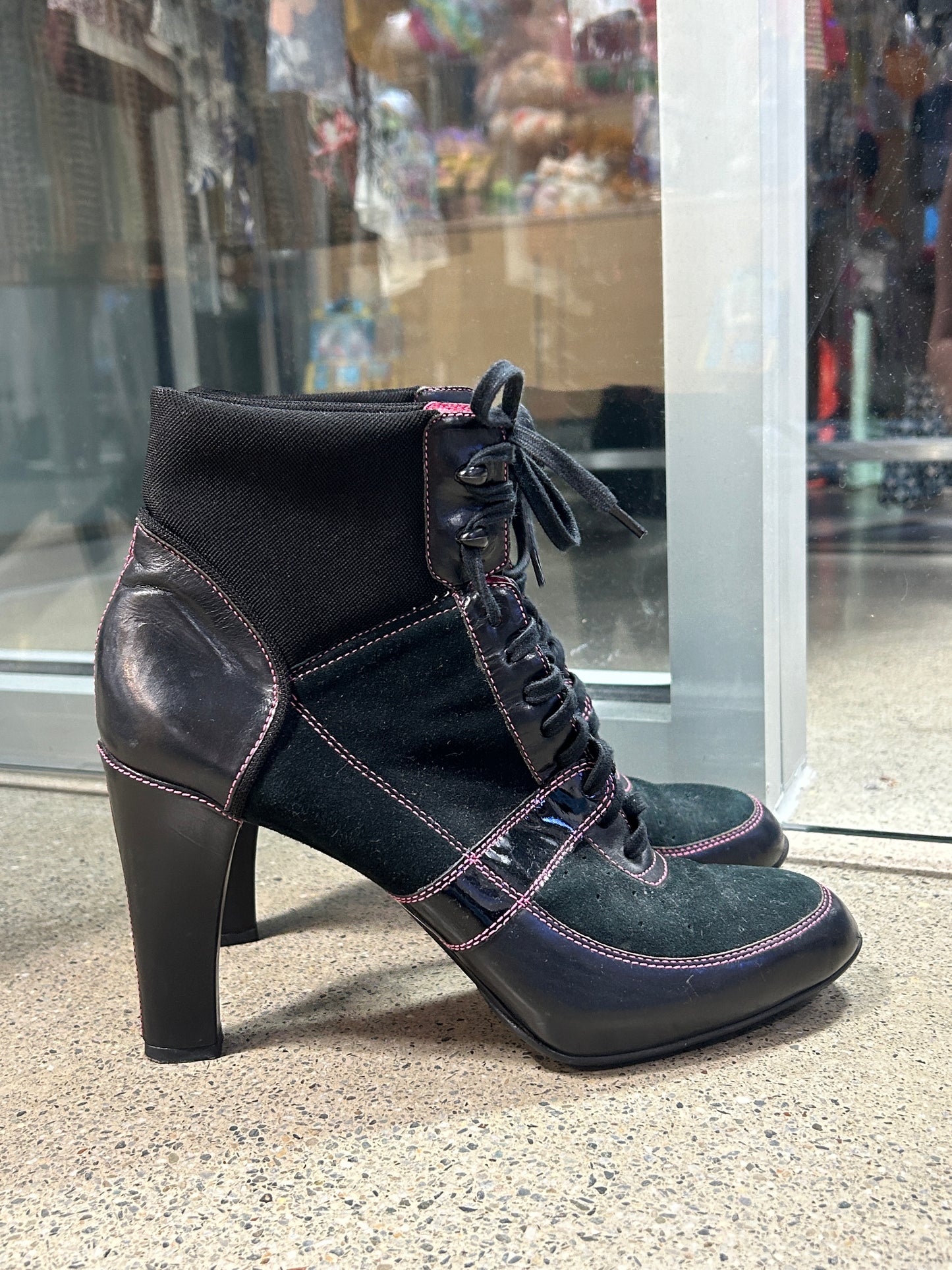 Black and pink lace-up heel boots