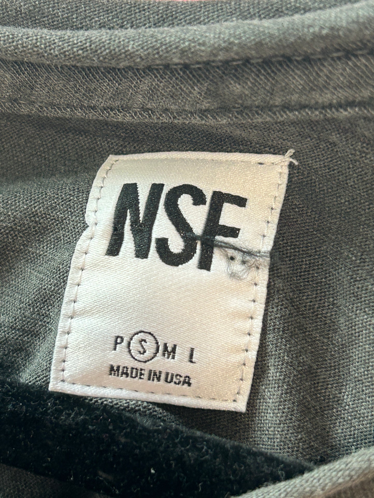“NSF” Ruffled Hem Tank