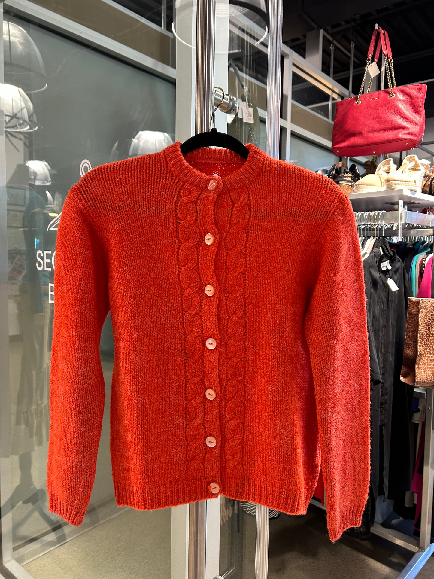 Orange cable knit button closure cardigan