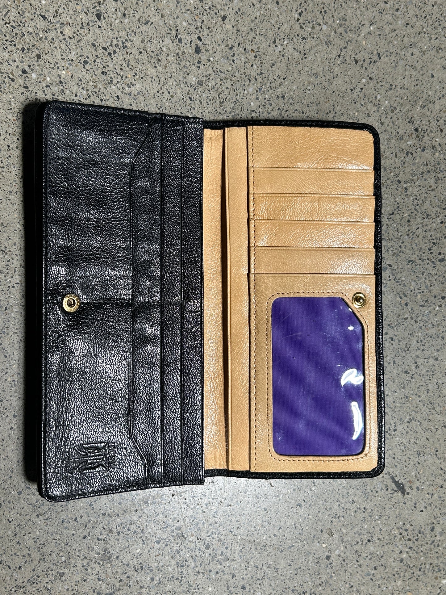 Black wallet with gold zipper