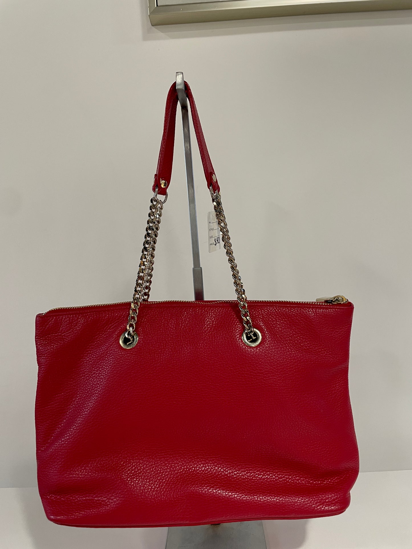 Red chain linked leather shoulder bag